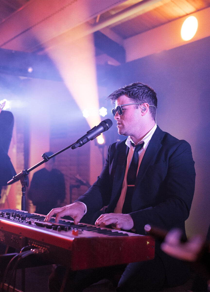 The band that performed during an art-inspired wedding reception had guests dancing all night long.