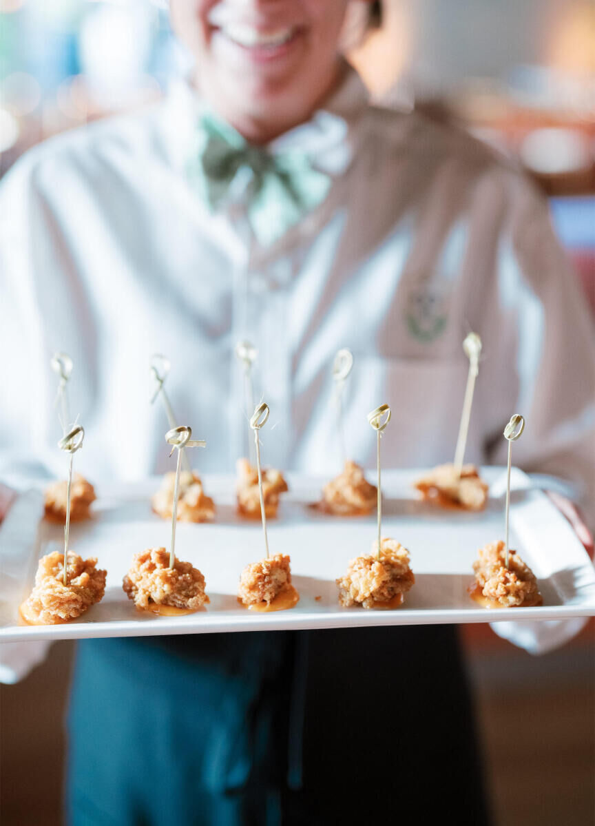 At their art-inspired wedding, a couple wanted to celebrate the culture and cuisine of Charleston, and did so with a vibrant menu courtesy of Cannon Green.
